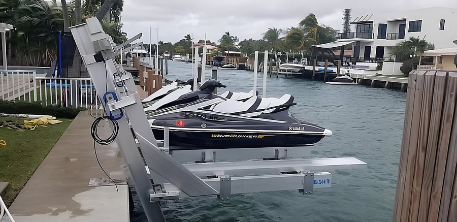 Yamaha WaveRunner on deco double jet ski lift — port-side angle South Florida dock